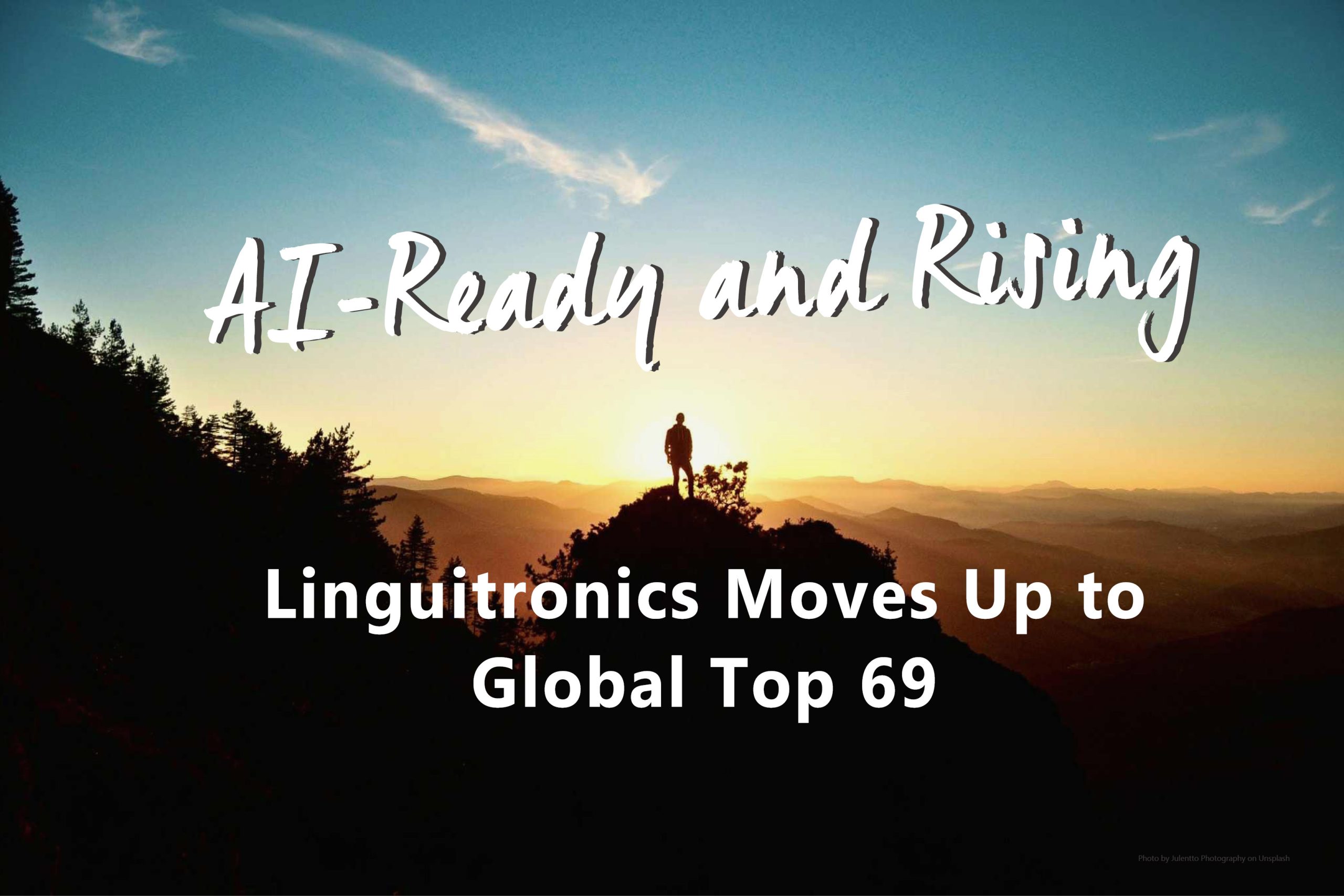 Linguitronics announces its climb to Global Top 69 with the slogan 'AI-Ready and Rising', shown over a scenic sunrise mountain view.